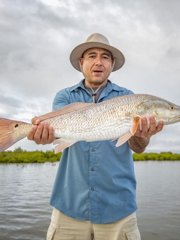 Man holding huge redfish Man holding huge redfish
